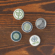 set-of-pin-buttons-white-1.25-front-68967a4e04a58-2.png